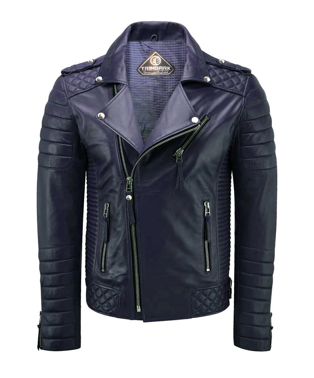 A navy blue men’s genuine leather biker jacket with quilted shoulders and sleeves, zippered pockets, asymmetric front zipper, and silver snap button details. The Trimafark brand label is visible inside the collar.